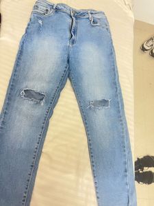 Ripped Knee Light Wash Jeans