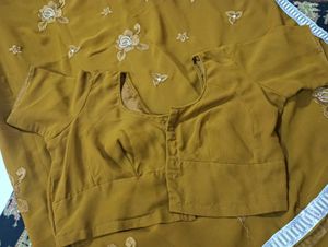 Floral Embroidered saree with stiched blouse