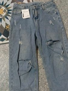Ripped Light Wash Jeans