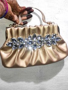 Elegant Gold Embellished Clutch