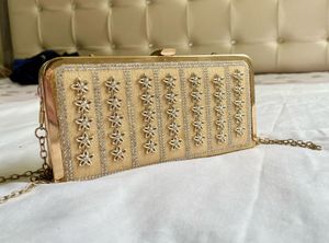 Elegant Gold Floral Embellished Clutch