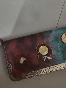 Stylish clutch for women with clasp lock