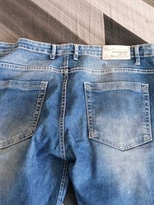 Ripped Blue Denim Jeans