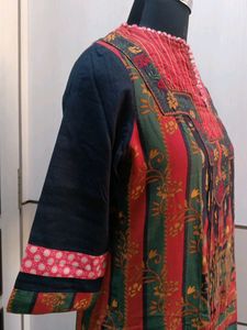 A colorful knee-length kurta