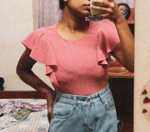 a cute top with ruffle sleeves.