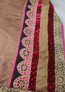 bright pink and golden brown Saree
