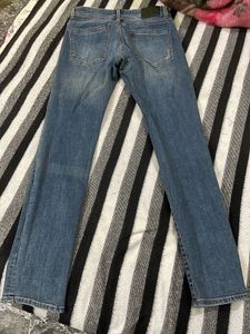 Distressed Denim Jeans