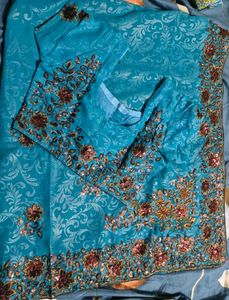 party wear saree with blouse.