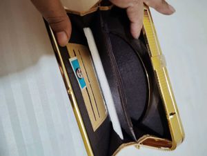 Gold Color Ka Bag Hai Yah Party Wear Ha