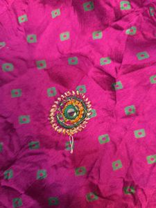 Megenta rajasthani tie-dye saree with bow blouse