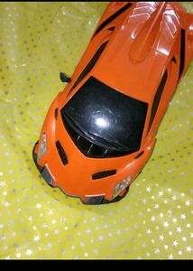 Vibrant Orange Coloured Car Toy Battery Operated