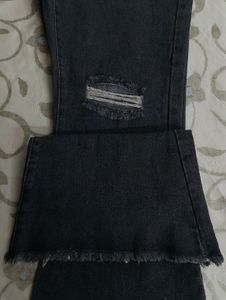URBANIC HEAVY DISTRESSED BOOTCUT BLACK JEANS