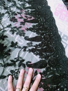 new beautiful embroidered black stone net saree.