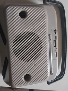 Mobile Stand And Bluetooth Speaker With Radio