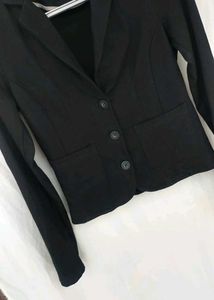 Black Blazer with Notched Lapels and Front Pockets