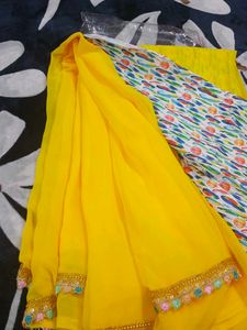 Yellow Georgette Saree With printed blouse(new)