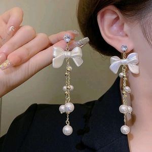 Sheron bow dangling earing