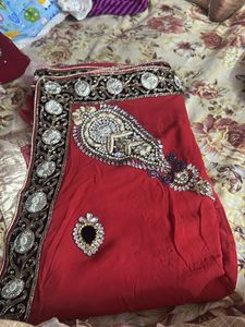 Red saree with embellishments