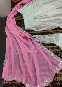 Off White Lehnga With Pink Dupatta