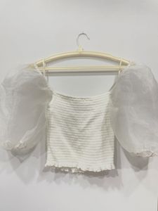 White top with organza sleeves