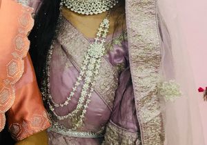 Bridal lehanga with aari work tassels 💜
