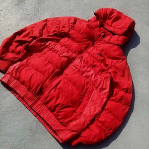 A Red Colour Nike Puffer Jacket