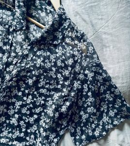 This is a floral print crop top.