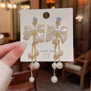 Sheron bow dangling earing
