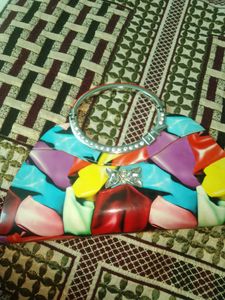 Multicolored Clutch Type Bag For Donation