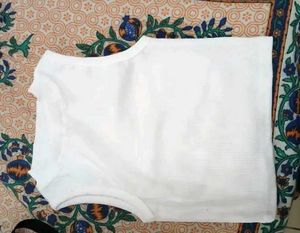 White Sleeveless Mock Neck Top