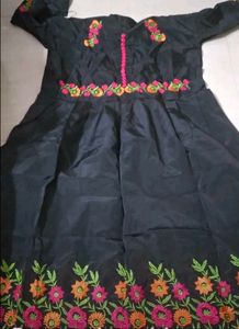 embroidered gown