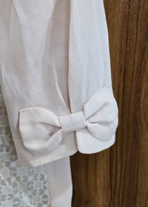 Elegant Cream Lace Panel Top with BowSleeve Detail