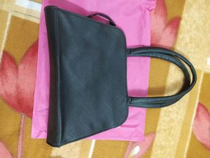 Black &amp; Golden Handbag