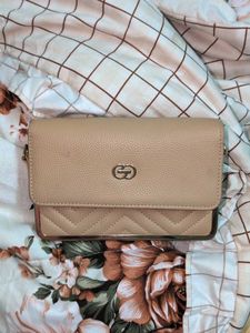 Elegant Nude Clutch with Gold Accents