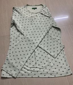 Light greenish blue top (Never worn before)