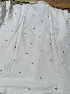 Uniqlo Men Cotton Mix Cream Printed Polo Tshirt