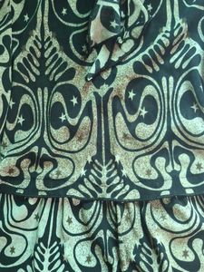 Patterned bow neck top