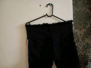 Black One Leg Knee Cut Jeans