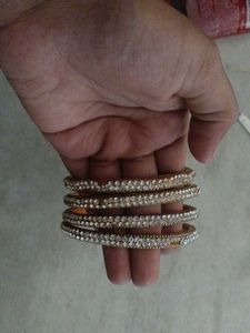 4 Shiny Bangles With One Bracelet Freebie