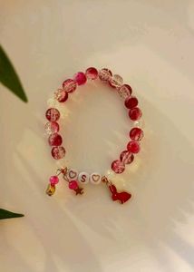 Two Bracelets And One Earrings