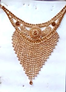 Golden Stone Necklace with ear rings and mangtika