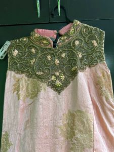 Elegant Peach And Golden Gown