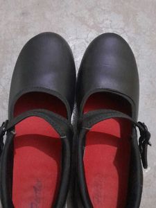 black and white school shoes