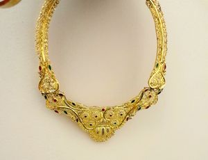 Gold Plated Set .Gorgeous look With Red And green meenakari Work.