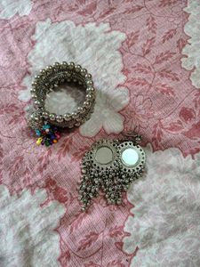 Silver tone bracelet and earrings