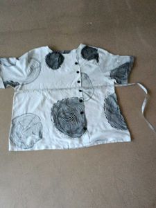 White Breezy top But one Sleeves Has flaws