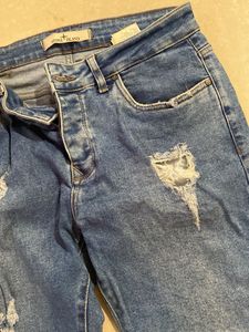 Ripped Blue Denim Jeans