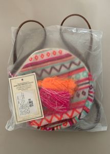 Astrid round Geometric print sling bag for women