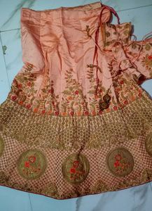 Peach and pink Embroidered bridal Lehenga Choli