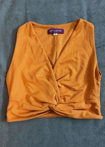 Uptownie Orange Twist Front Crop Top